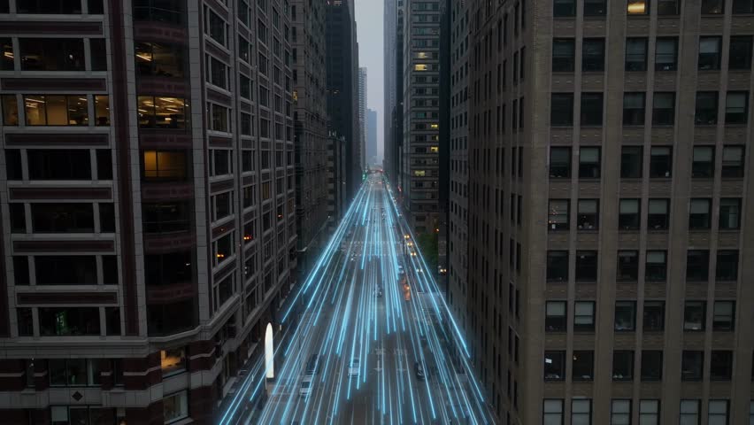 5G digital sign above a city street with light trails between high-rise buildings. Aerial inn large American city with high speed fiber optic connectivity among skyscrapers. Royalty-Free Stock Footage #3431733717