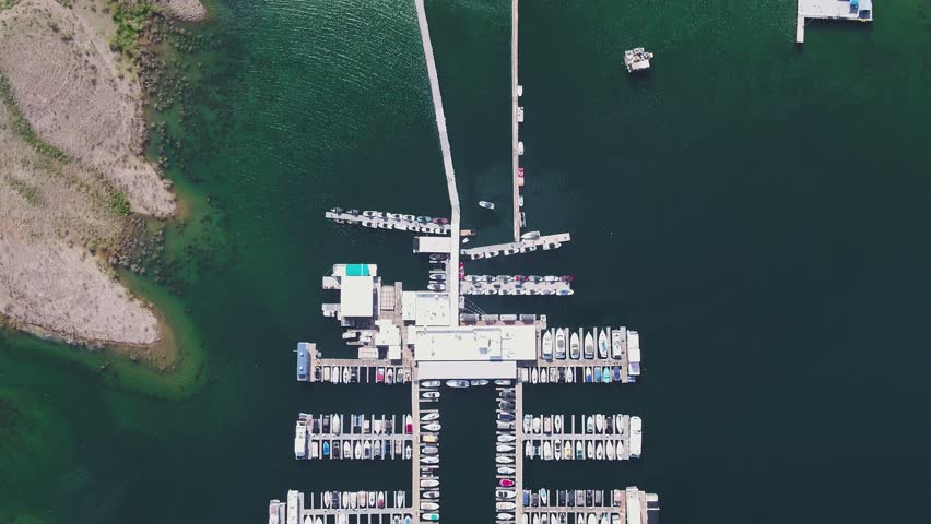 A high-flying drone shot over Lake Mead, a massive reservoir formed by the Hoover Dam on the Colorado River, that lies on the border of Arizona and Nevada, just east of Las Vegas.