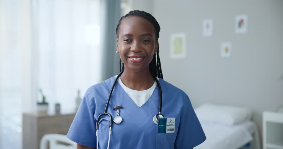 Black woman, nurse and face with smile for healthcare at hospital, expert with pride and medical professional. Medicine, wellness and happy in career with portrait, integrity and advice for kindness