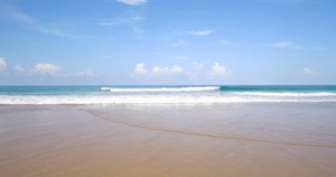 Over view beach landscape water wave rolling come in to sandy beach location Phuket Thailand. On summer 2022. ProRes422
