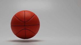 Seamless loop animation Basketball rotating isolated on white background. Standard orange basket ball. Copy space banner with a place for text on the right. perfect for sports advertising - Powered by Shutterstock - Get 15% off with code: PIKWIZARD15