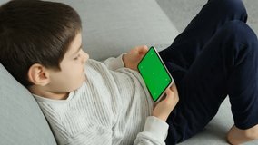 Kid Using Phone With Green Screen Chroma Key