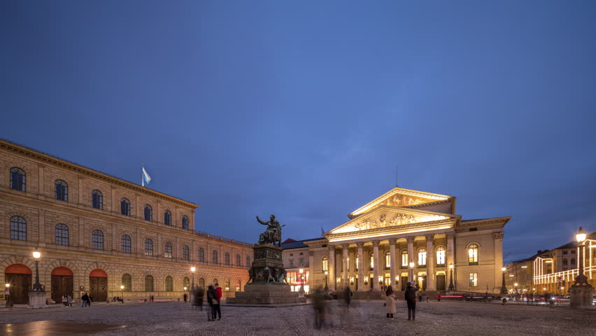 Munich National Theatre or Nationaltheater on the Max Joseph square day to night transition timelapse. Historic opera house, home of the Bavarian State Opera. The statue in the center. Germany Royalty-Free Stock Footage #3432283791