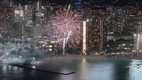 Tourists attraction on Oahu island, Hawaii. People celebrating life on summer vacation. Scenic fireworks exploding in night sky at hotels. Colorful fireworks at Waikiki luxury resorts on Fridays night - Powered by Shutterstock - Get 15% off with code: PIKWIZARD15