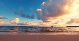 Tropical island beach shore at sunrise, beautiful color sea sunset 