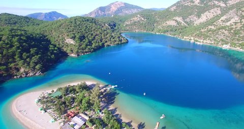 mediterranean bays and beach blue water sky drone footage aerial green pine trees oludeniz blue lagoon famous fethiye oludeniz turkey fethiye above
