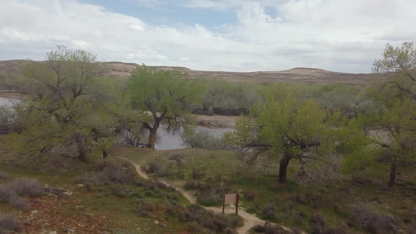 Pan from San Juan River to pictographs