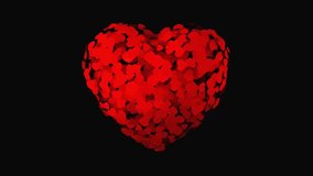 Animation red heart shape spread on black background.