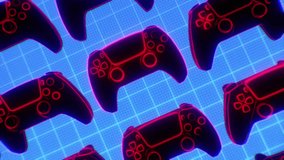 Looping sequence of a group of Neon lined Game Controllers spinning randomly over a grid background.
 - Powered by Shutterstock - Get 15% off with code: PIKWIZARD15