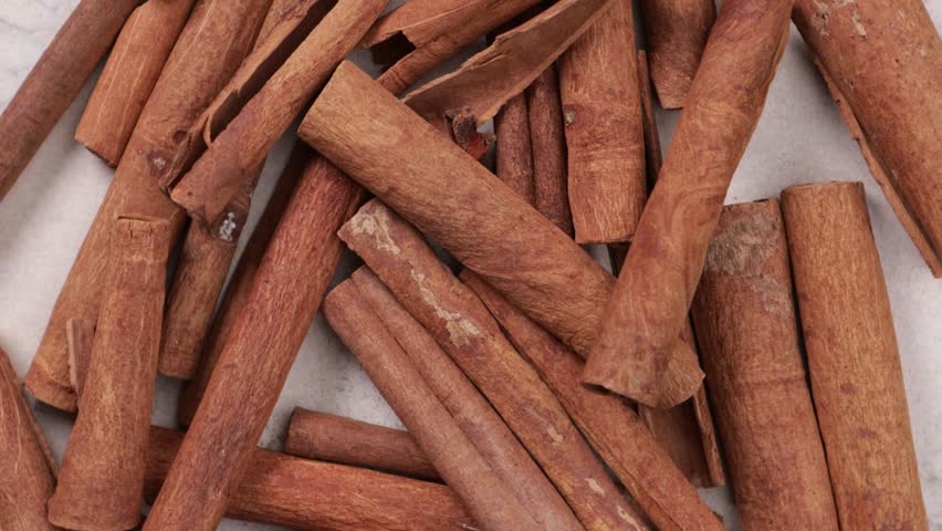 cinnamon sticks in bowl top view food