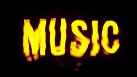 Text sign template isolated on black background. Word music glowing yellow in darkness with water waves moving over text with ripples and splashes. - Powered by Shutterstock - Get 15% off with code: PIKWIZARD15