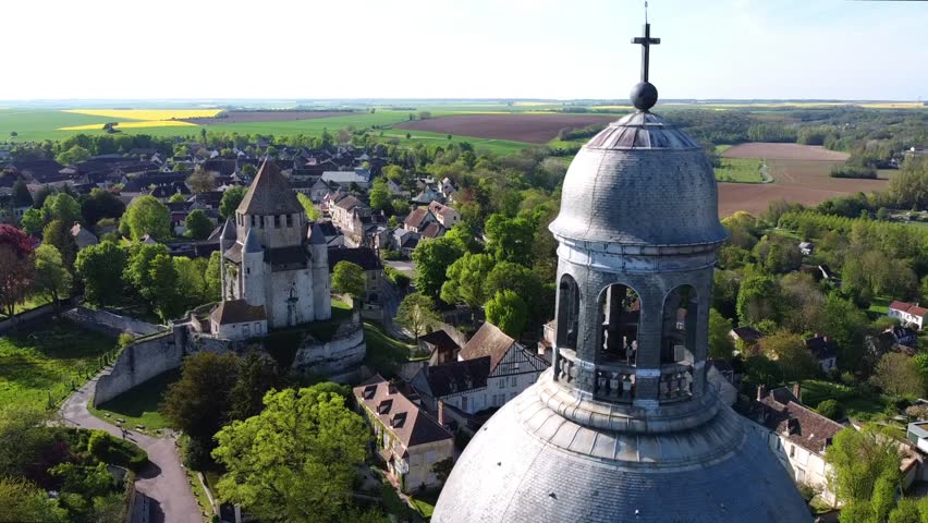 Aerial view of the Saint Quiriace Collegiate Church in Provins, a medieval city in Seine et Marne, France - Slate dome on top of a hill in the French countryside
