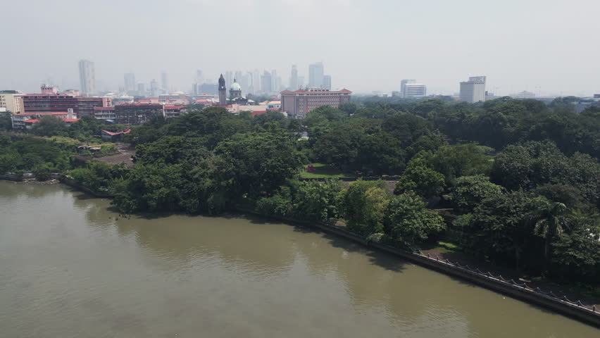 Ascending aerial footage of Intramuros district, a historic heart of Metro Manila, Philippines