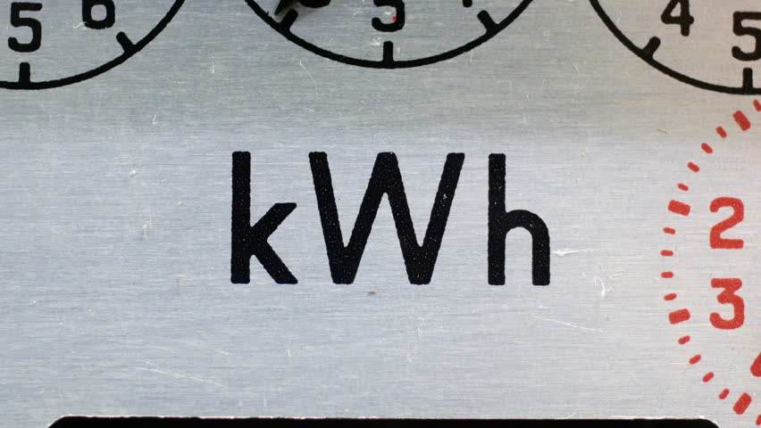 A close-up of an electricity meter kWh symbol. Concept for Kilowatt hour unit, electric meter reading, energy, fuel, heating, high bills and cost of living. Static shot. Royalty-Free Stock Footage #3433246019