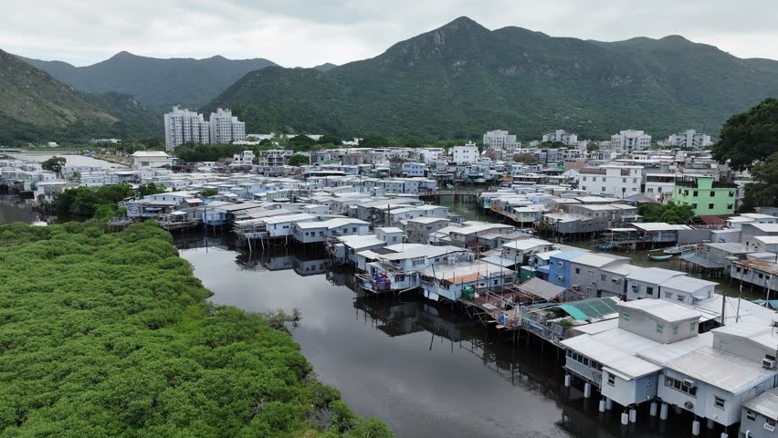 Tai O Fishing Village Touristic Boat Sailing in Canal,Lantau Island Hong Kong. Picturesque Island and Boats ply the waterway between stilts