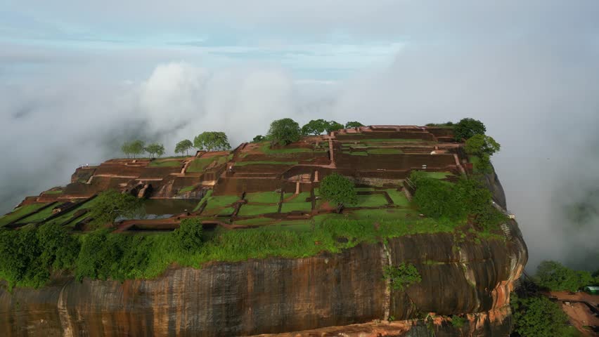 Aerial view over Sigiriya or Lion Rock in Sri Lanka in clouds. An ancient fortress rock landmark