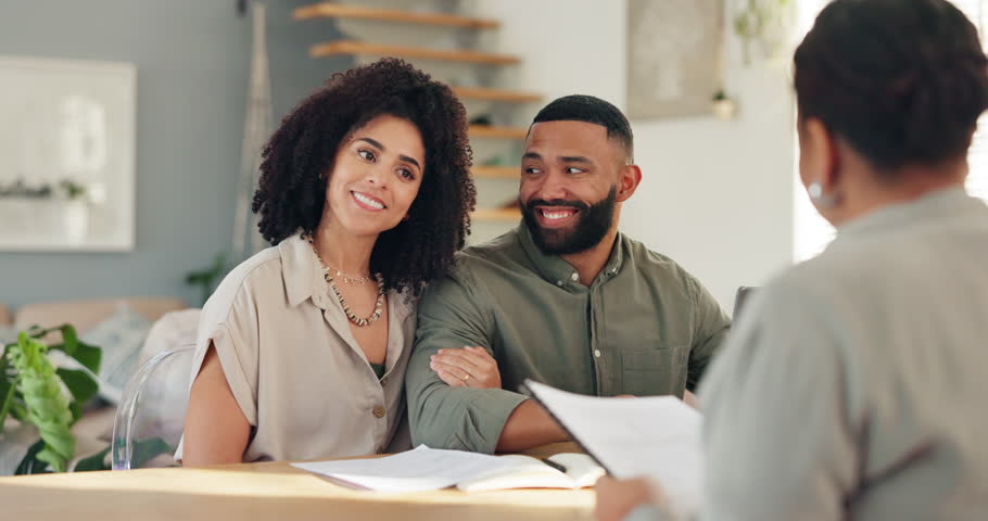 Handshake, meeting and couple with real estate agent for buying new home, house or property. Happy, deal and young man and woman shaking hands for apartment or building purchase with realtor.