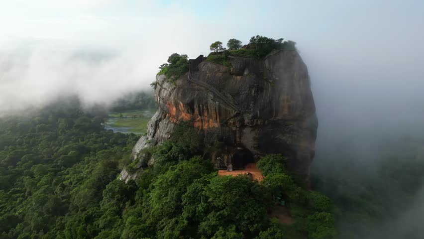 Aerial view over Sigiriya or Lion Rock in Sri Lanka in clouds. An ancient fortress rock landmark