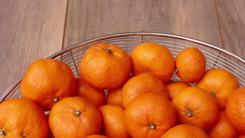 Fresh mandarin oranges fruit or tangerine in bucket  Royalty-Free Stock Footage #3433428575