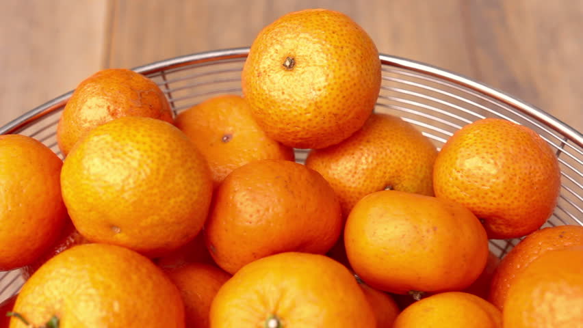 Fresh mandarin oranges fruit or tangerine in bucket  Royalty-Free Stock Footage #3433428671