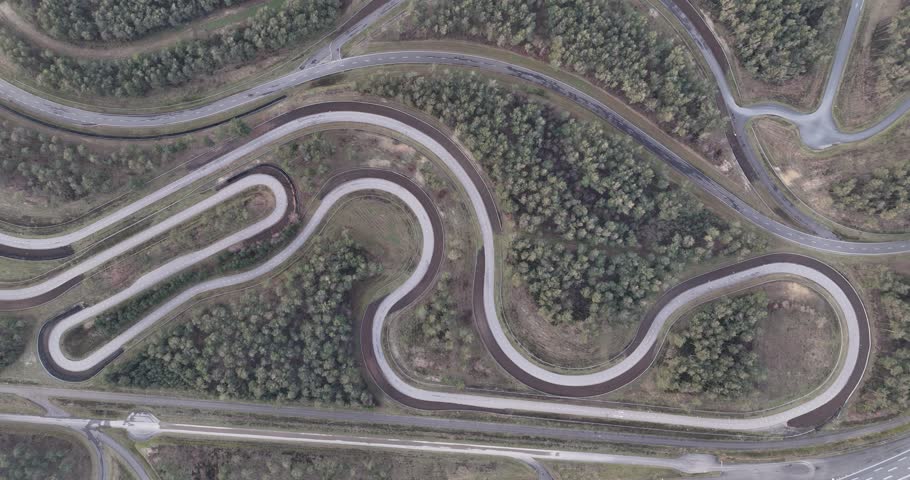 Birds eye view on a test track for road vehicles. For companies, individuals and proffesionals. Multi purpose test facilities, from special surfaces of road, to high speeds straightaway