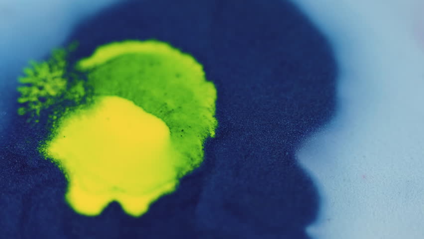 Paint splash. Ink drop. Defocused blue green yellow color grain particles texture fluid blend blotch mix flow motion abstract background. Royalty-Free Stock Footage #3433588301