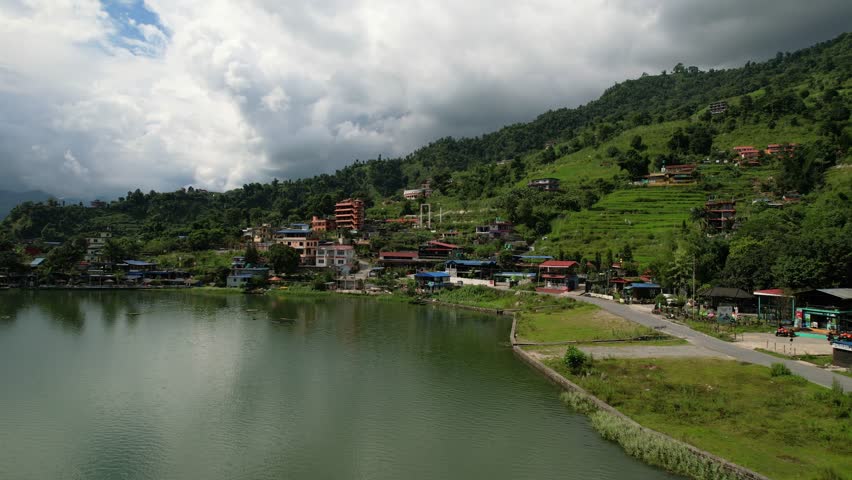 Beautiful aerial landscape of Phewa Lake and village on the valley at the foothills of the Annapurna mountain in Pokhara, Nepal