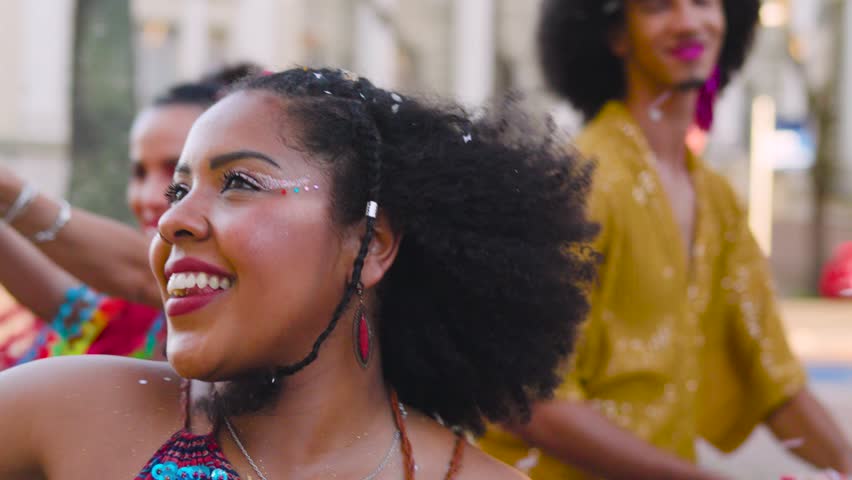 Carnival Vibrance: Joyful Woman Celebrating with Dance, Glittering with Confetti at Brazilian Street Fest.