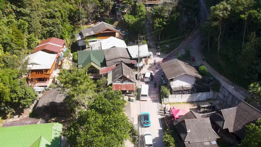 Aerial Flying Over Mae Kampong Village Rooftop Located At Chiang Mai Province. Pull Back Shot Royalty-Free Stock Footage #3433744673