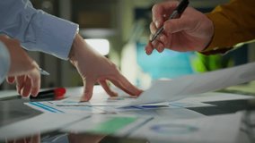 A data audit in a company's office is carried out by focused middle managers. Senior Manager examines data and metrics, analyzing data and research to determine progress and growth dynamics - Powered by Shutterstock - Get 15% off with code: PIKWIZARD15