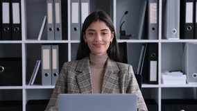 Businesswoman Talking In Video Call In Work Break