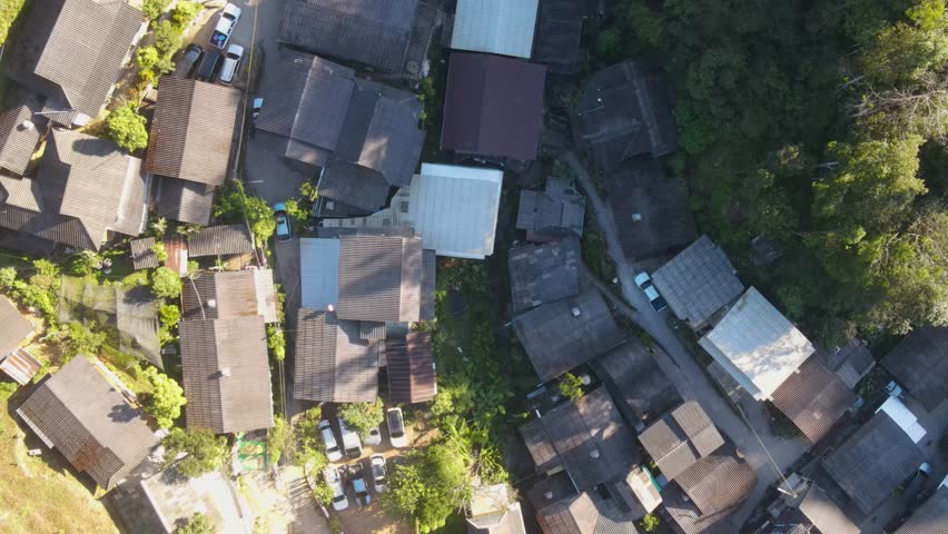 Aerial Birds Eye View Mae Kampong Village Rooftop Buildings Located At Chiang Mai Province. Pedestal Up Royalty-Free Stock Footage #3433976769