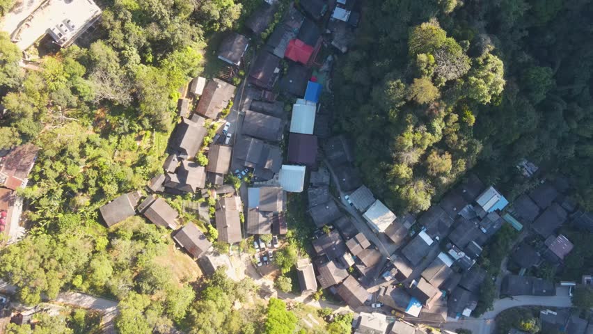 Aerial Birds Eye View Mae Kampong Village Rooftop Buildings Located At Chiang Mai Province. Push Forward Shot Royalty-Free Stock Footage #3433981329