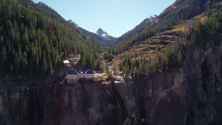 Pullback drone shot of Bridal Veil Falls in Telluride, CO