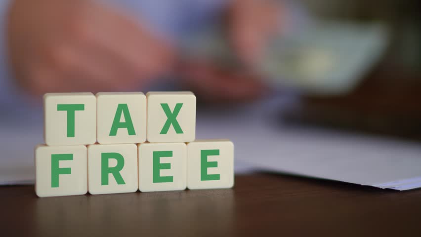 Concept of tax-free investment. Selective focus with money on the background. Royalty-Free Stock Footage #3434056081