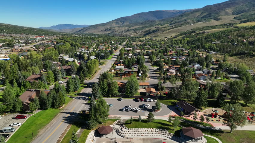 Colorado Silverthorne condo apartment homes aerial drone cinematic i70 Blue River downtown summer Rocky mountain town Lake Dillon Green Mountain Reservoir forward motion slowly