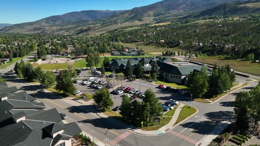 Colorado Silverthorne recreation rec center skatepark above aerial drone cinematic i70 Blue River fly fishing fisherman paradise downtown summer Rocky mountain town Lake Dillon forward motion slowly