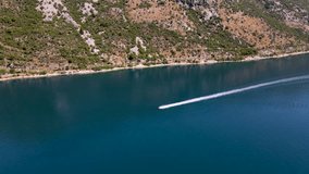 Aerial View Of A Motorboat Quickly Coming Into The Bay Of Kotor.