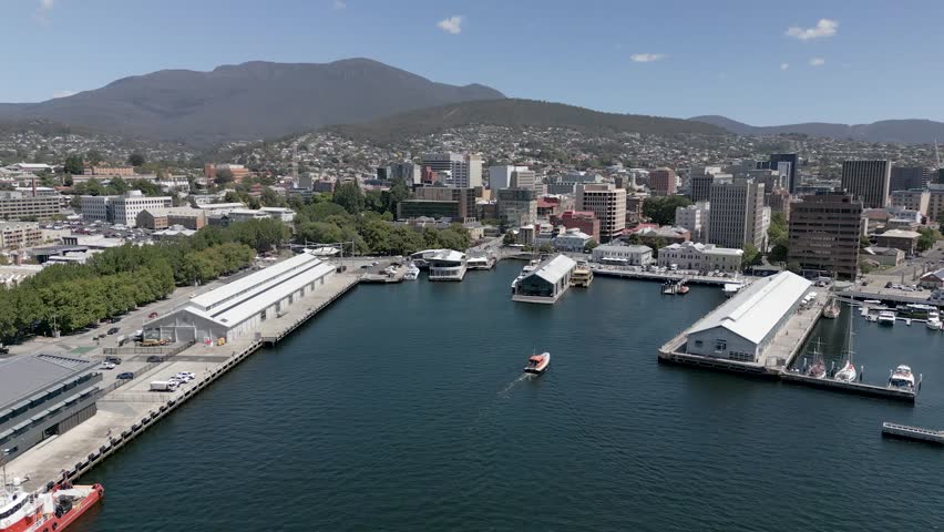 Drone shot of Hobart, Tasmania, Australia. Constitution Dock, Mount Wellington, Hobart CBD. Pan shot