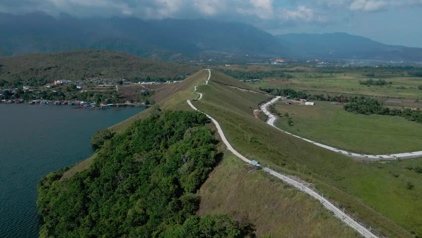 Path in the middle of the hill with lake and Mountain views