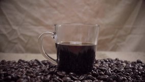 Pouring milk into black coffee. Black coffee mixed with milk, coffee art concept - Powered by Shutterstock - Get 15% off with code: PIKWIZARD15