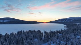 Frozen Lake Of Pyhajarvi During Sunset In Lapland, Finland. Winter Season. Aerial Sideshot - Powered by Shutterstock - Get 15% off with code: PIKWIZARD15