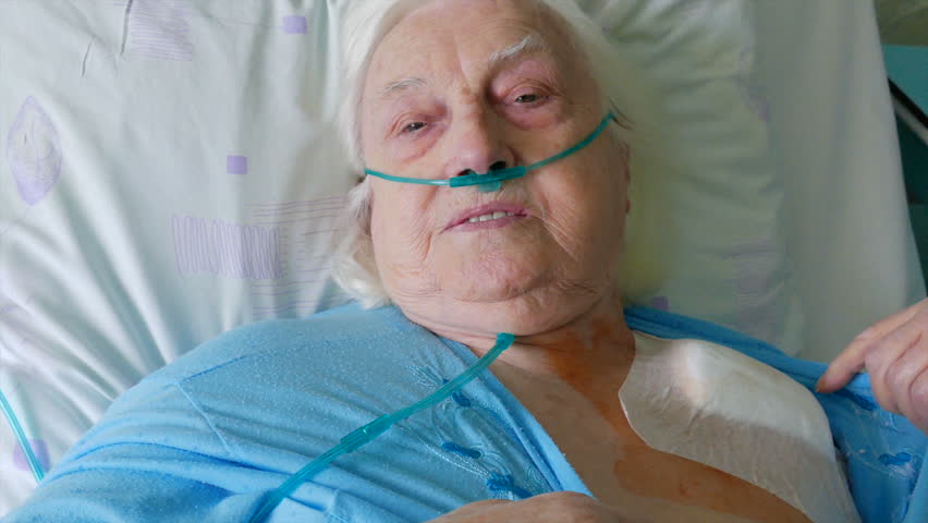 Old woman after surgery of implantation of heart pacemaker Royalty-Free Stock Footage #3434586105