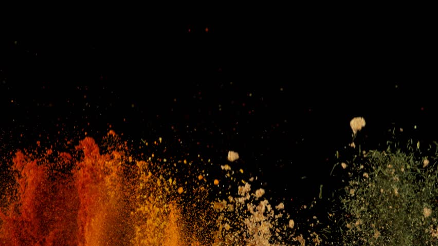 Super Slow Motion Shot of Colorful Explosion of Various Spices on Black Background at 1000fps.