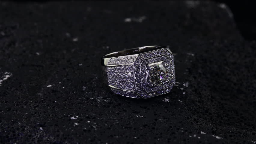 beautiful diamond man ring on black rock with balck background