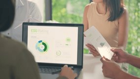 A team of professionals discuss circular economy principles displayed on a laptop, highlighting sustainable business practices in a meeting. - Powered by Shutterstock - Get 15% off with code: PIKWIZARD15