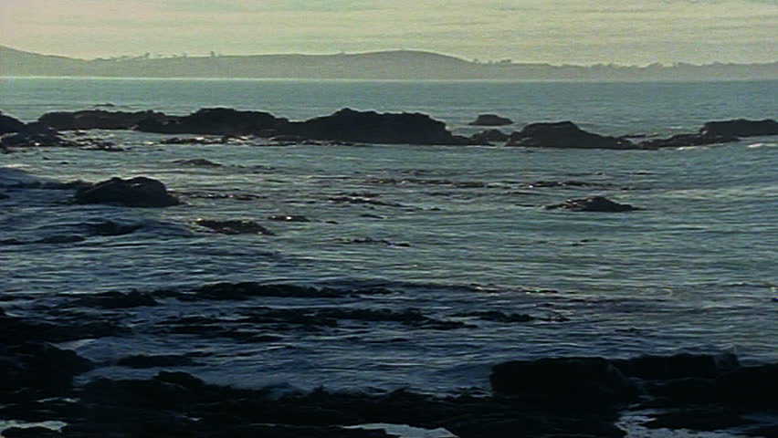 Waves crashing against rocks