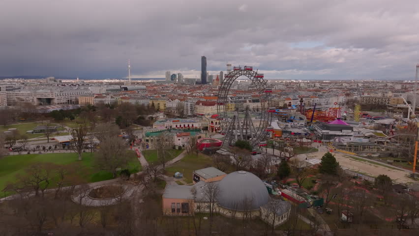 Aerial view of Prater amusement park with popular tourist attraction Wiener Riesenrad. Historic Ferris Wheel. Vienna, Austria