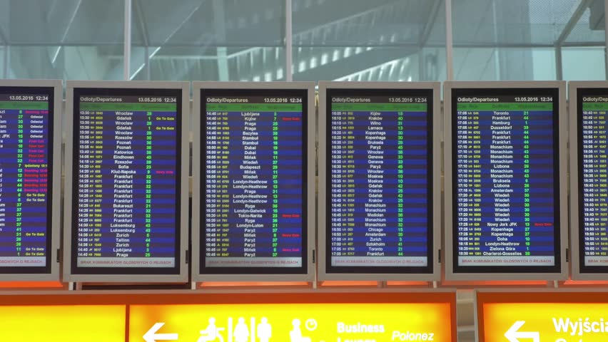 Departure board at the airport in 4k Royalty-Free Stock Footage #3434952487