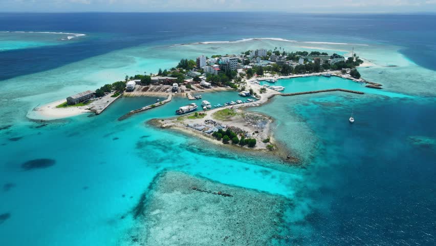 Gulhi island near Maafushi on Kaafu Atoll. Tropical Island with clear ocean and beach, Maldives. Aerial View